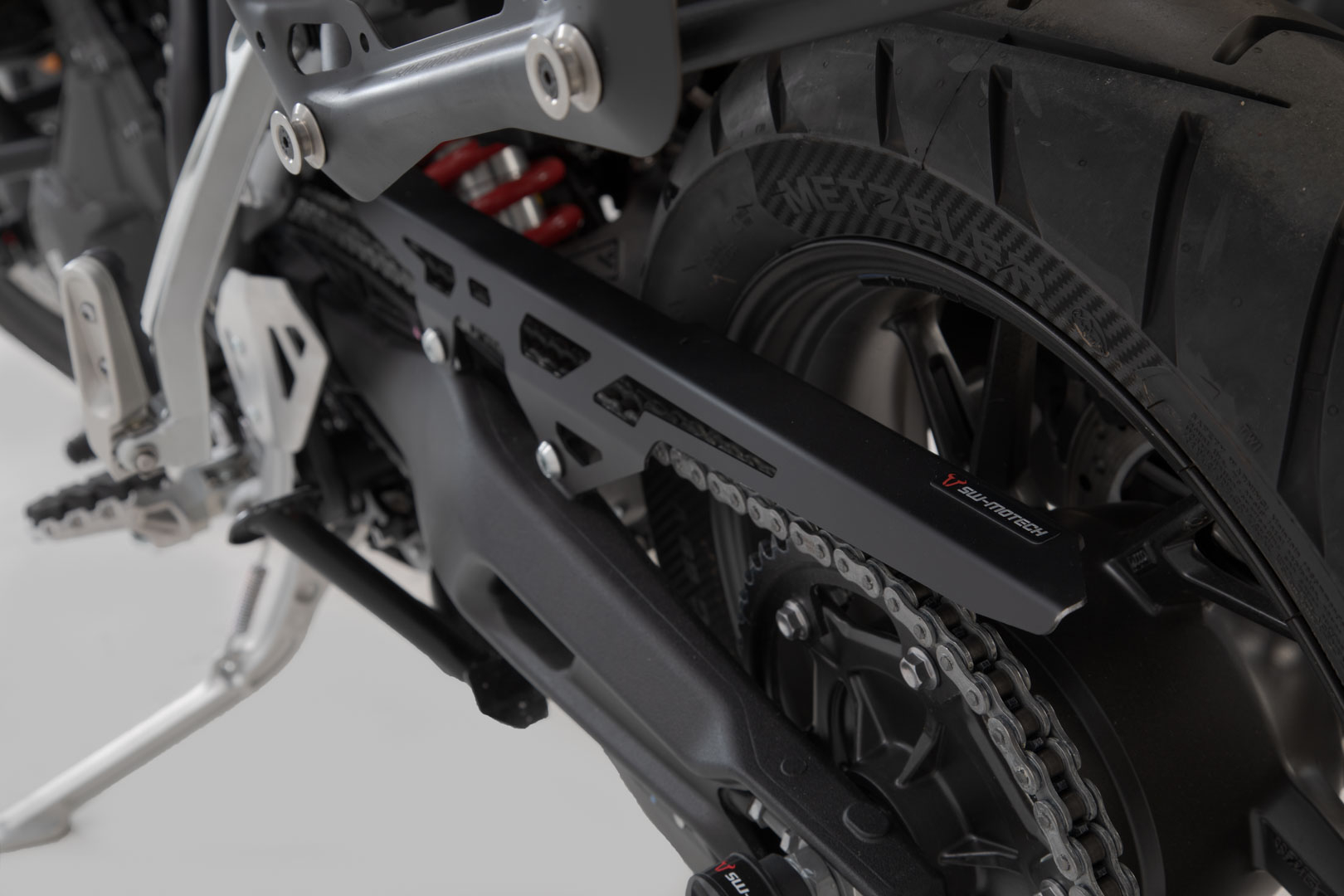 Chain guard – Black. Triumph Tiger 900/ GT/ Rally/ Pro.